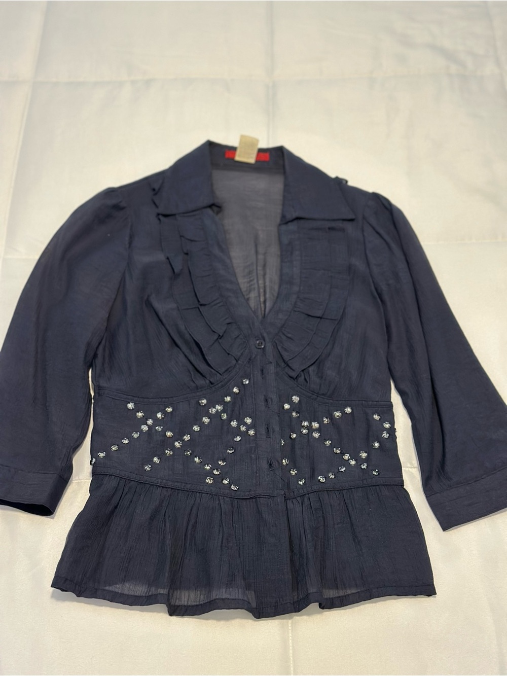 Ruffled Navy Blouse with Embellished Waist